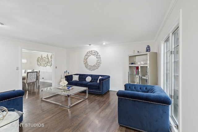 living room with dark hardwood / wood-style flooring and ornamental molding