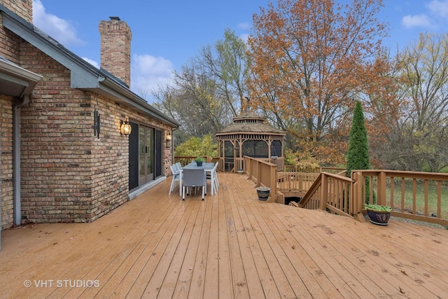 wooden deck featuring a gazebo