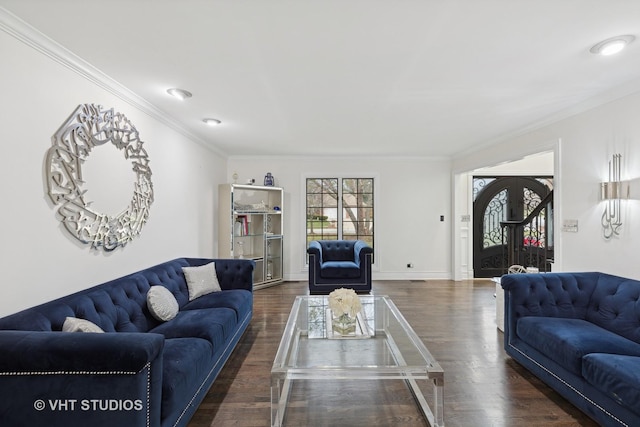 living room with crown molding, french doors, and dark wood-type flooring