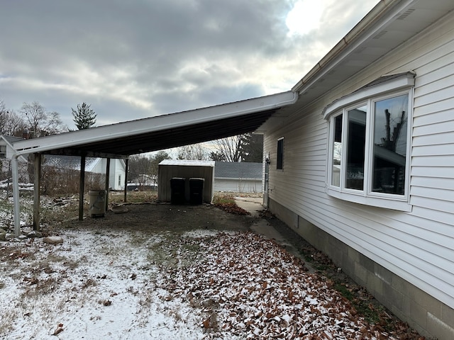 exterior space with a carport