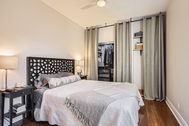 bedroom featuring vaulted ceiling, dark wood-type flooring, and ceiling fan