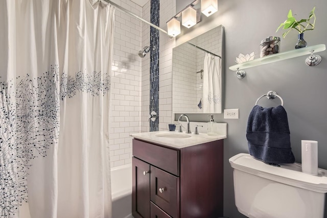 full bathroom featuring vanity, toilet, and shower / tub combo with curtain