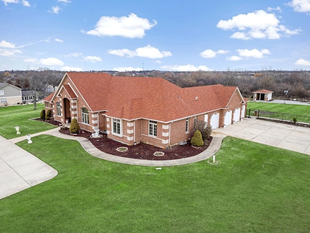 exterior space with a yard and a garage