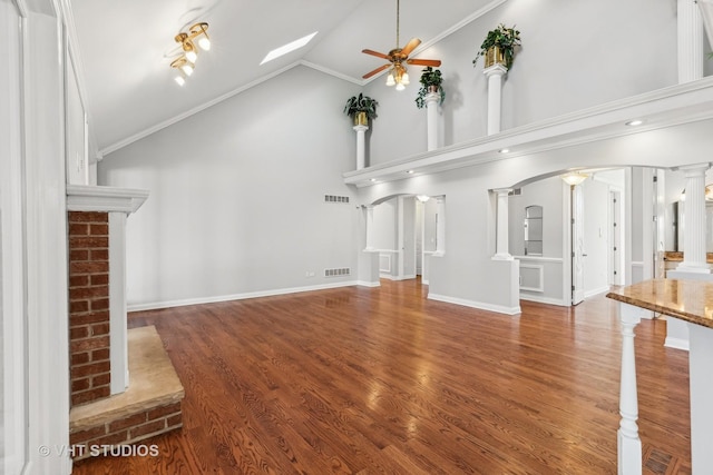 unfurnished living room featuring wood-type flooring, high vaulted ceiling, ceiling fan, and crown molding