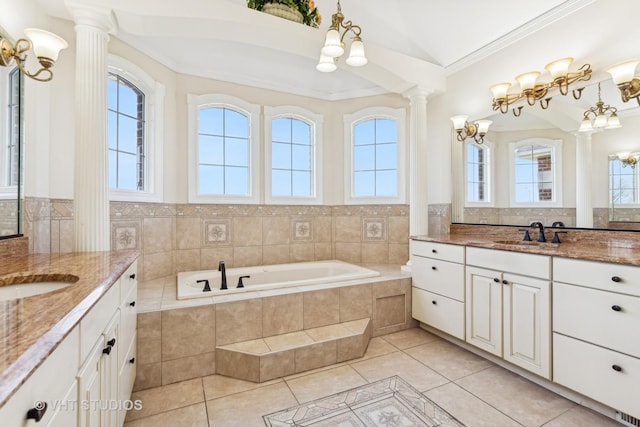 bathroom featuring tile patterned flooring, decorative columns, a wealth of natural light, and lofted ceiling