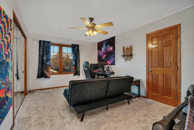 living room with carpet and ceiling fan