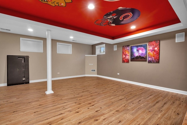 basement with light wood-type flooring