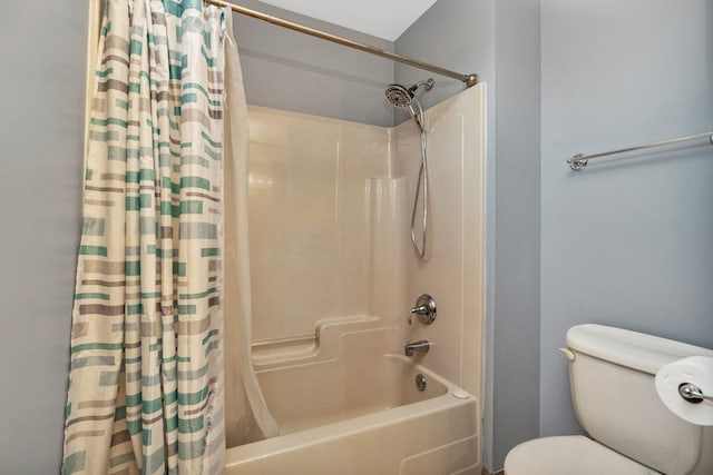 bathroom with toilet and shower / bathtub combination with curtain