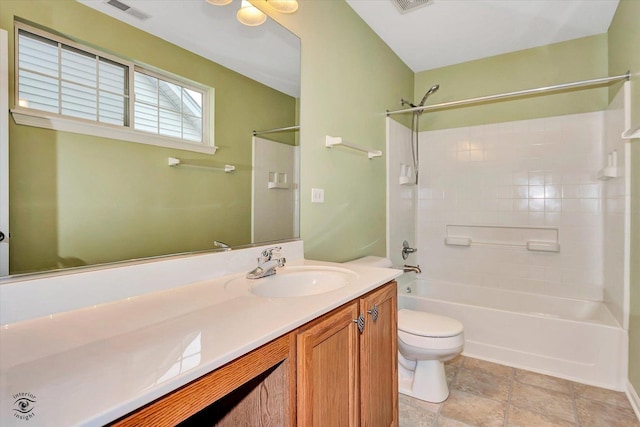 full bathroom featuring vanity, shower / bathtub combination, and toilet