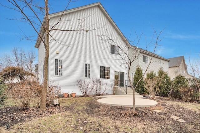 rear view of property with a patio