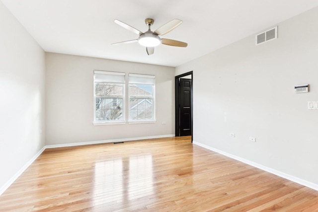 unfurnished room featuring ceiling fan and light hardwood / wood-style floors