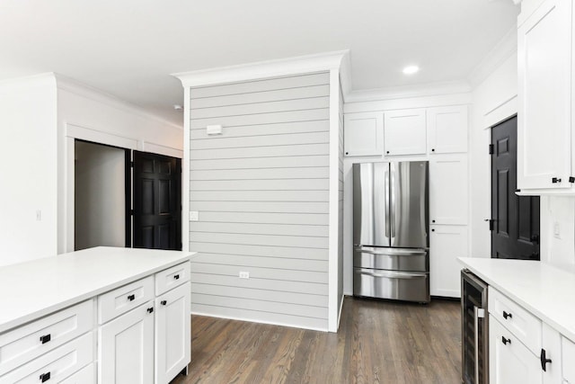 kitchen with white cabinets, wine cooler, dark hardwood / wood-style floors, and stainless steel refrigerator