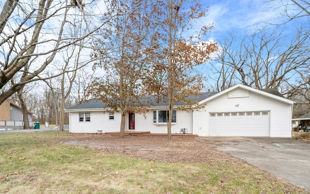 single story home with a garage and a front yard