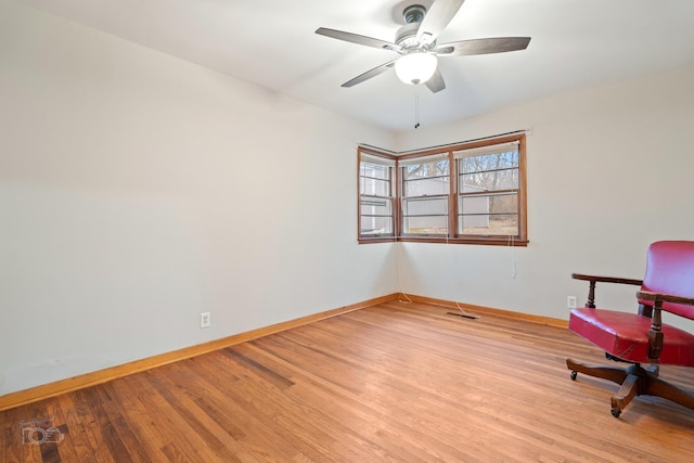 unfurnished room with ceiling fan and light hardwood / wood-style flooring