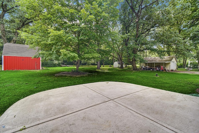 view of patio with a shed