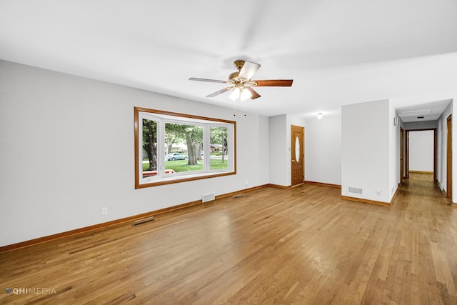 unfurnished living room with light hardwood / wood-style floors and ceiling fan