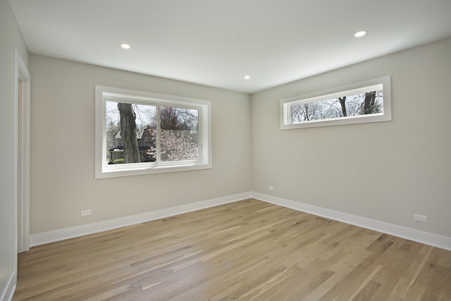 empty room with light wood-type flooring