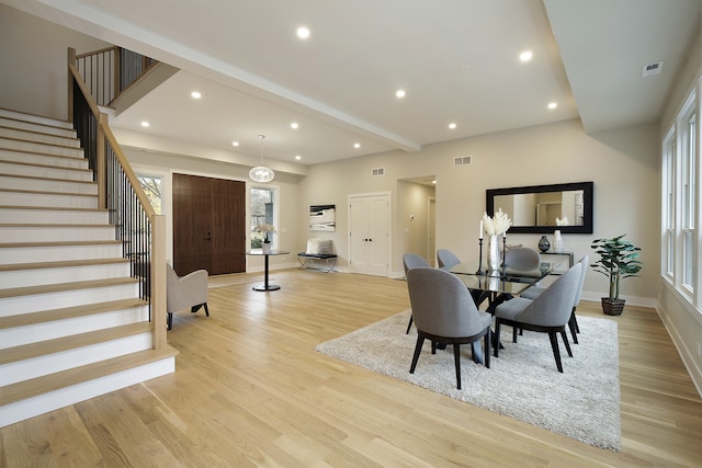 dining room with light hardwood / wood-style flooring