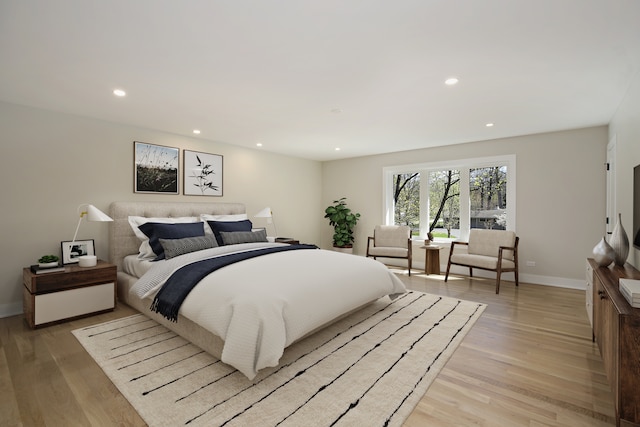 bedroom with light hardwood / wood-style flooring