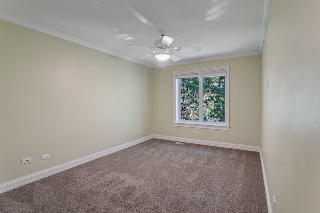 carpeted empty room featuring ceiling fan and ornamental molding