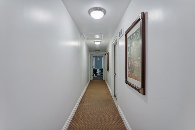 hall featuring carpet floors