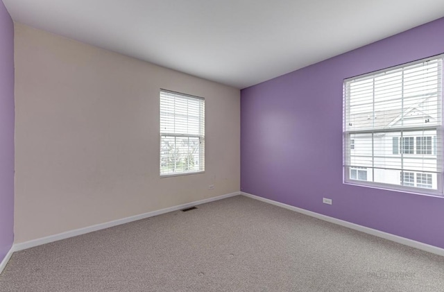 empty room with carpet floors