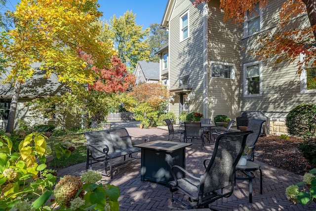 view of patio with a fire pit