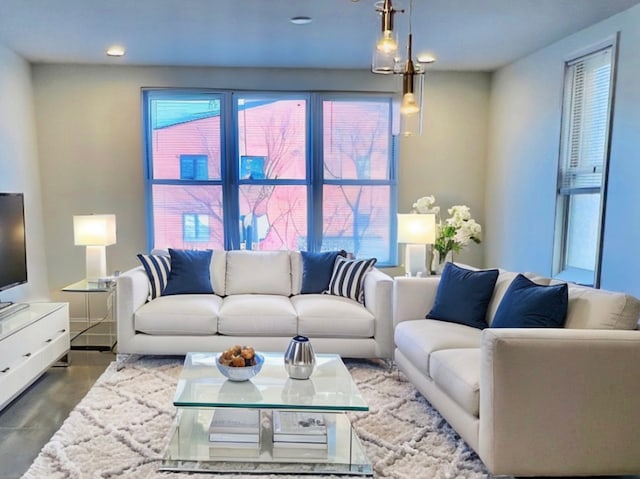 living room featuring concrete floors