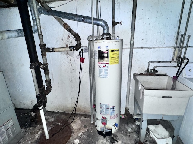 utility room with water heater