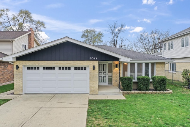 view of front of house featuring covered porch, a garage, and a front lawn