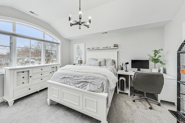 carpeted bedroom featuring an inviting chandelier and lofted ceiling