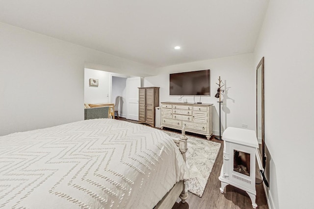 bedroom featuring light wood-type flooring