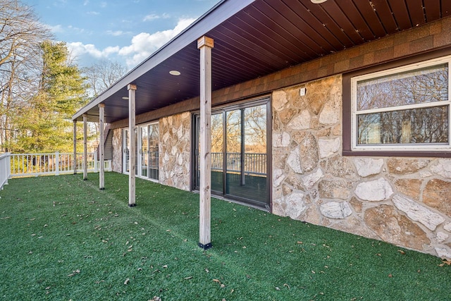 view of home's exterior with a yard