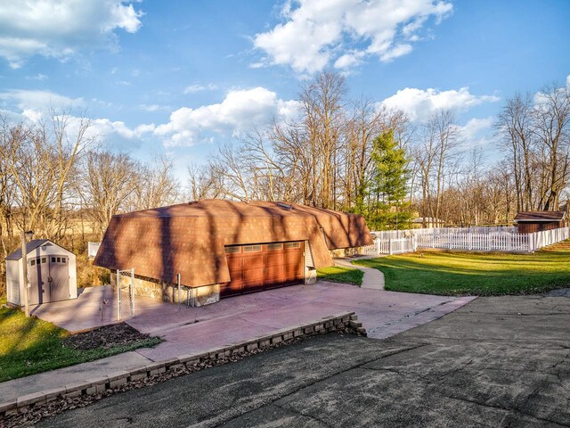 exterior space with a shed