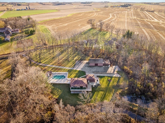 birds eye view of property featuring a rural view