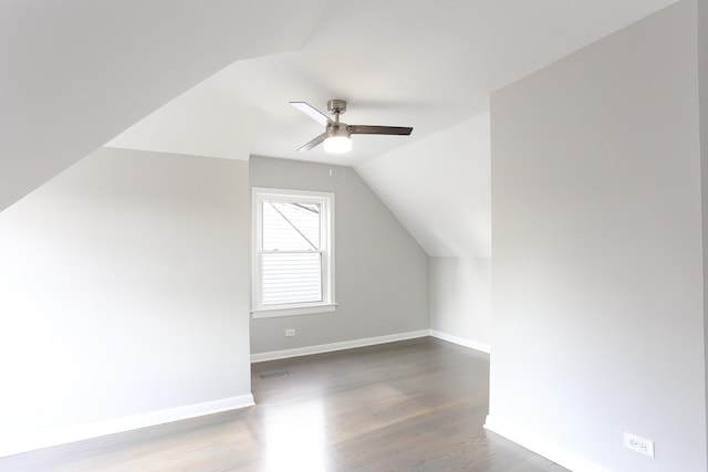 additional living space with hardwood / wood-style flooring, ceiling fan, and lofted ceiling