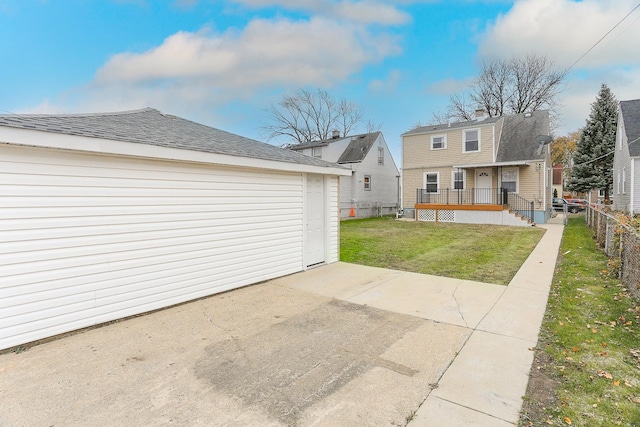 back of house featuring a yard