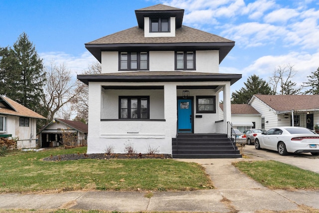 view of front of home with a front lawn