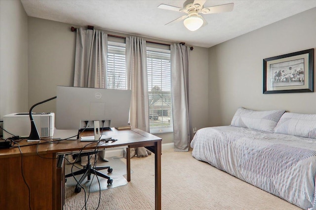 bedroom featuring carpet floors and ceiling fan