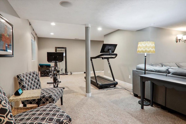 exercise room with light carpet