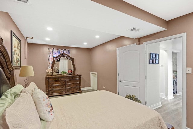 bedroom featuring light hardwood / wood-style flooring