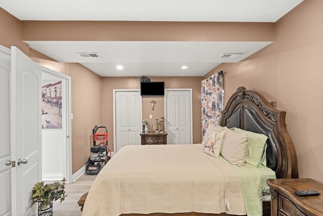 bedroom featuring light hardwood / wood-style floors