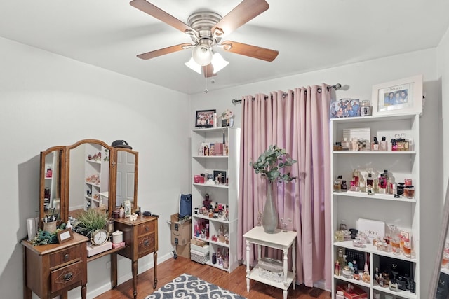 miscellaneous room featuring hardwood / wood-style flooring and ceiling fan