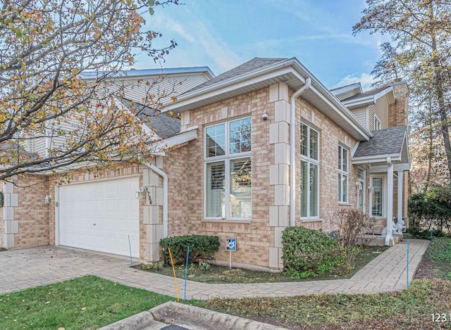 view of property exterior with a garage