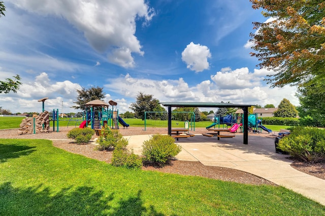 community play area featuring a lawn