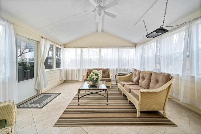 sunroom / solarium featuring vaulted ceiling with beams and ceiling fan