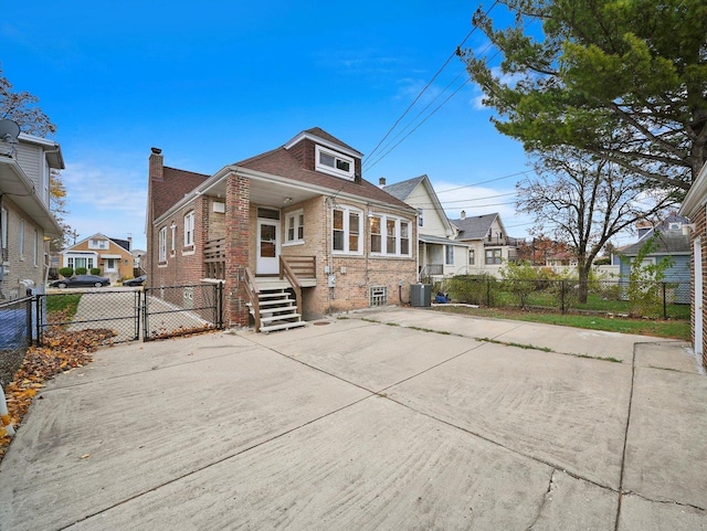 view of front of home with cooling unit