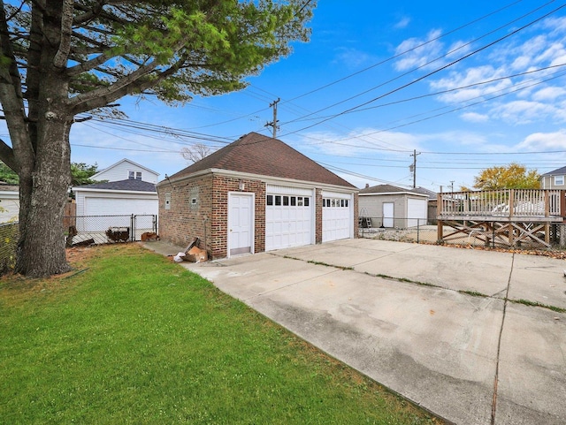 garage with a yard