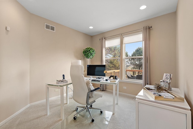 view of carpeted office space