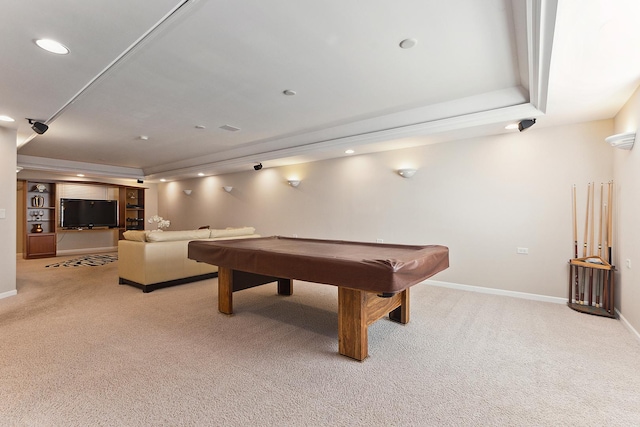 rec room featuring light carpet, a raised ceiling, and billiards